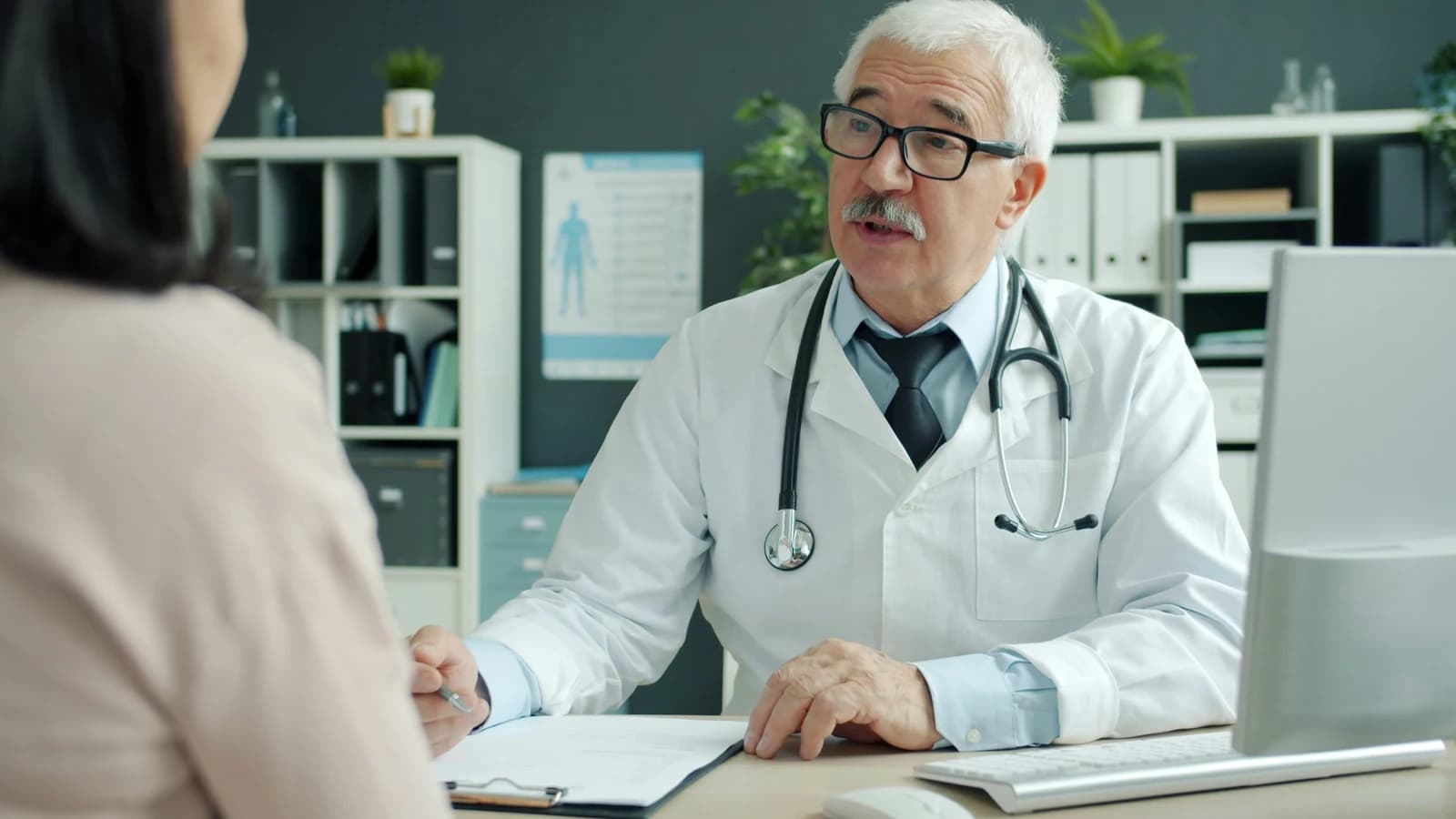 Doctor speaking with a patient during a consultation